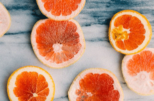 Orange, Grapefruit & Cardamom infused water